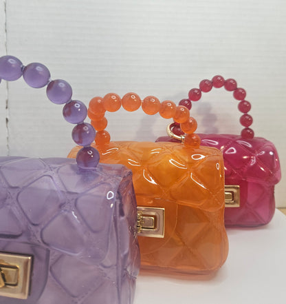 Mini jelly crossbody transparent purse.